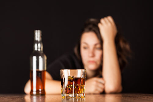 Woman who needs a drug alcohol addiction intervention in Philadelphia