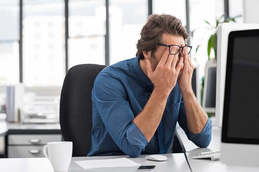 Man dealing with executive burnout