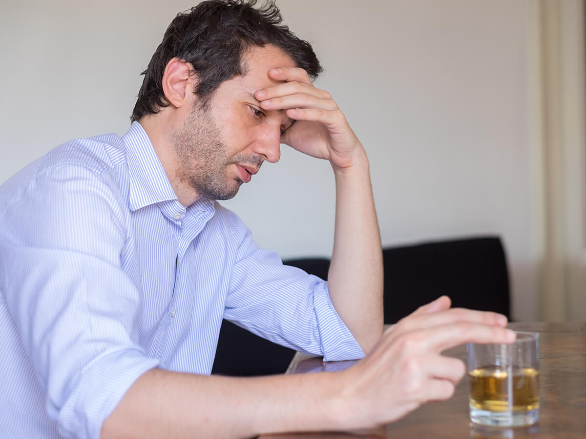Man exhibiting clear signs of being a functioning alcoholic